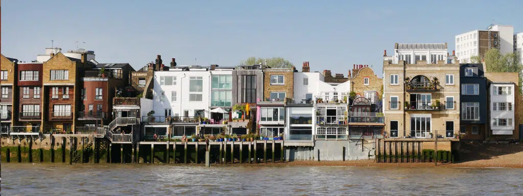 Top 10 Places to Live in the UK - houses in London on the Thames